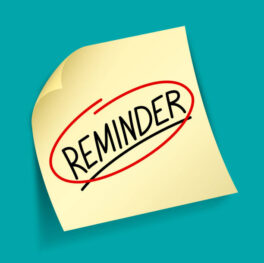 reminder-written-note-on-piece-of-yellow-paper